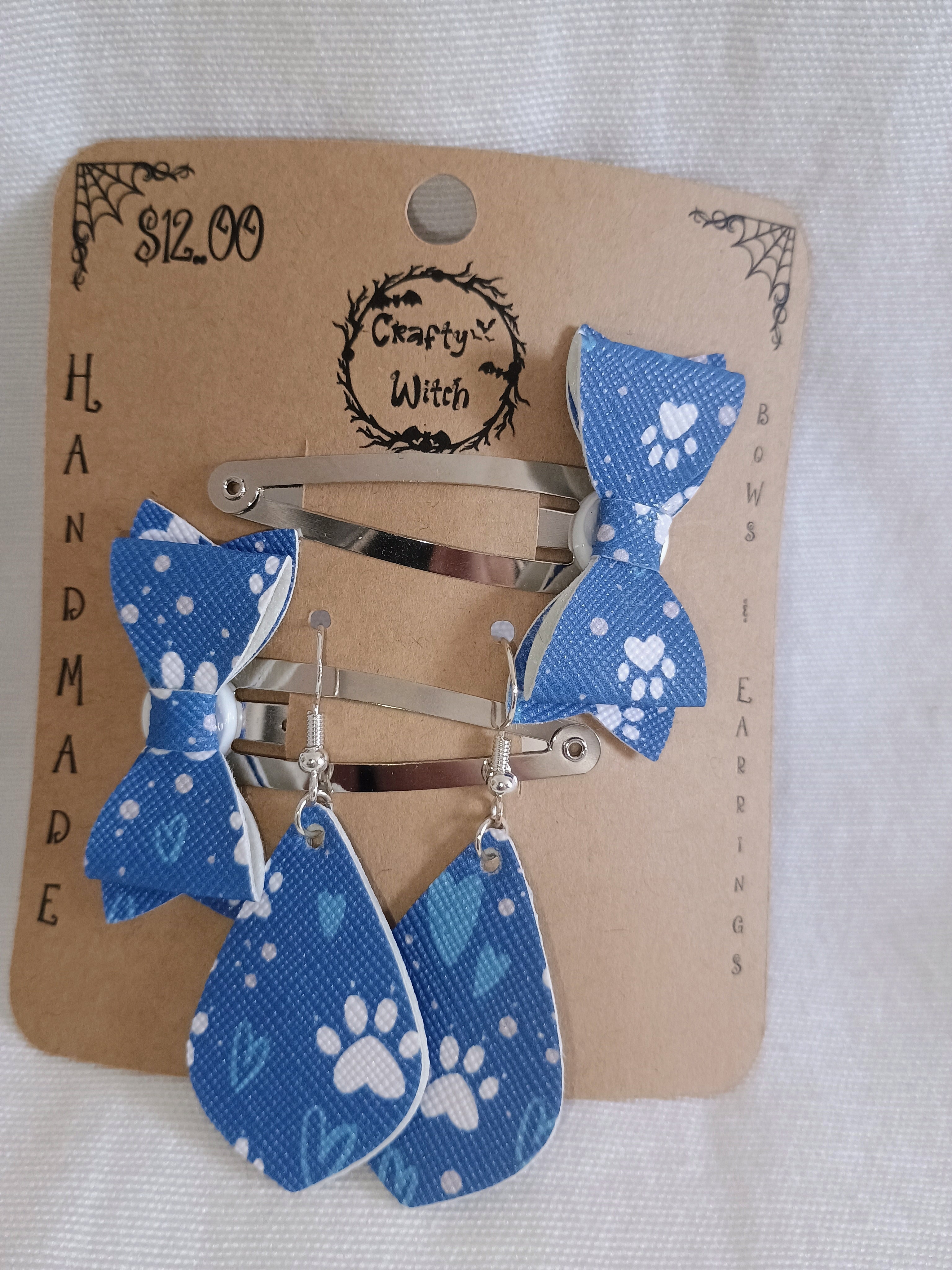 blue barrettes and earrings