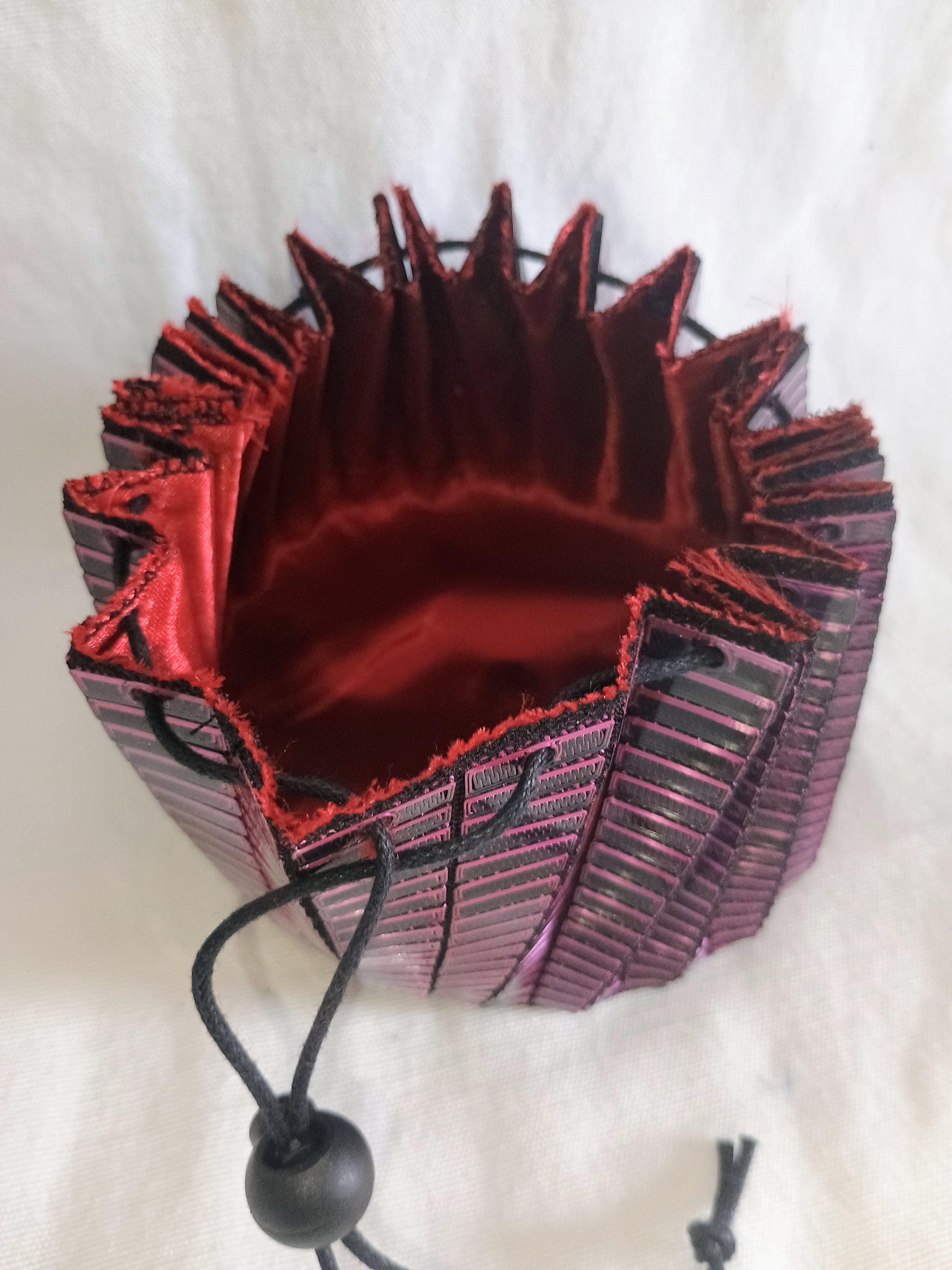 Pink and black 3d printed dice bag with red satin liner